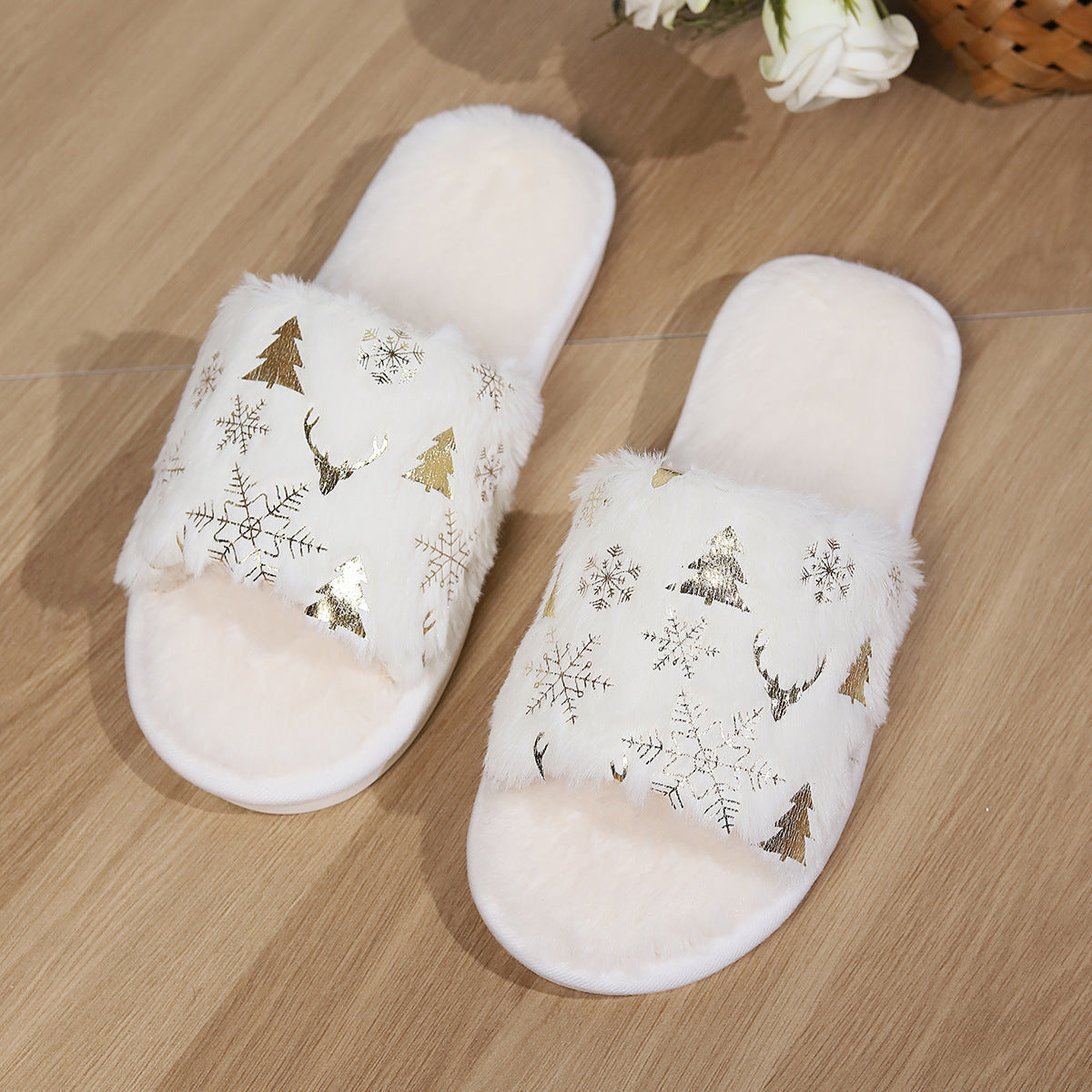 Chaussons d'hiver Doudounea blancs douillets avec motifs dorés de Noël, flocons de neige et sapins, parfaits pour un confort chaleureux à la maison