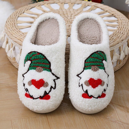 Chaussons de Noël Doudounea blancs douillets avec motif lutin vert et rouge, cœur décoratif, intérieur molletonné pour un confort optimal