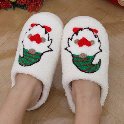 Chaussons de Noël Doudounea en peluche blanche avec motif Père Noël, design festif et douillet pour un confort optimal en intérieur